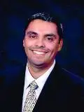 Dr. Manuel Valerin, DDS
