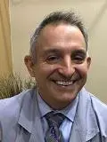 Dr. Emilio Couret, DDS