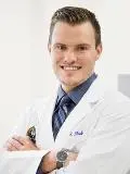 Dr. Robert Madrigal, DDS