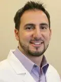 Dr. Tariq Riyal, DDS