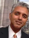 Dr. Roland Outarsingh, DDS