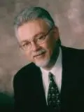 Dr. Lewis Gilbert, DDS