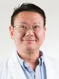 Dr. Kumjohn Tanvishut, DDS