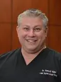 Dr. Howard Winter, DDS