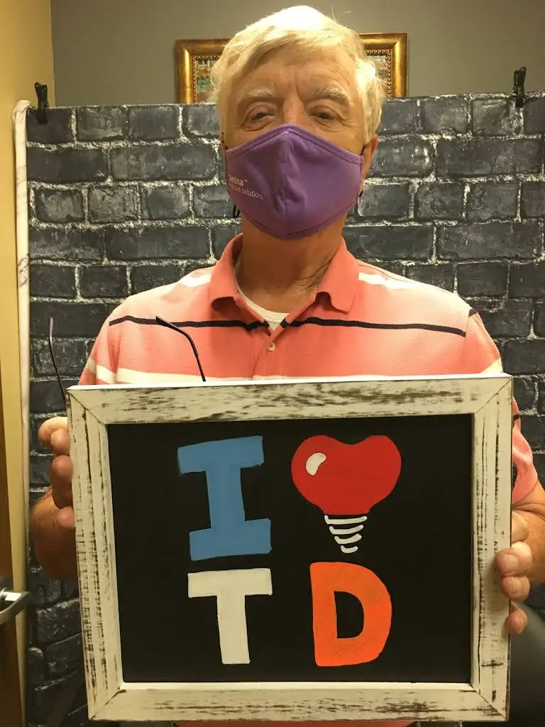 TITANIUM DENTAL Implants & Periodontics