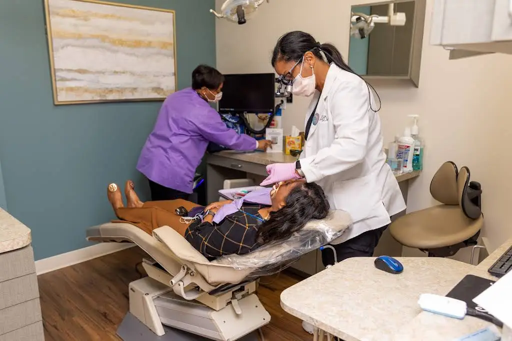 Smiles By Design: Rena Brown DMD, Dr. George Brown III