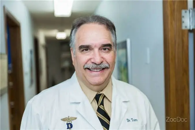Dr. Tom Vukodinovich DDS, LLC