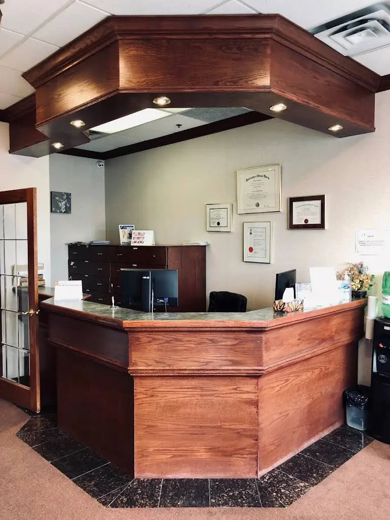 Dr. S. Dhillon & Associates - Professional dental clinic exterior with modern facilities