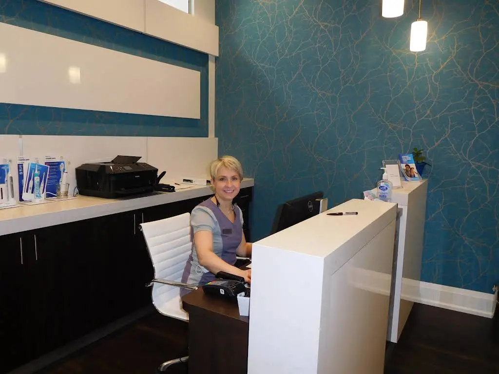 Dr. Gina Ha & Associates - Professional dental clinic exterior with modern facilities
