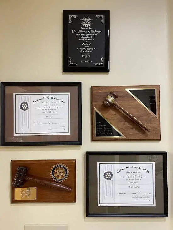 Custom Orthodontics: Dr. Thomas Herberger, Inc.