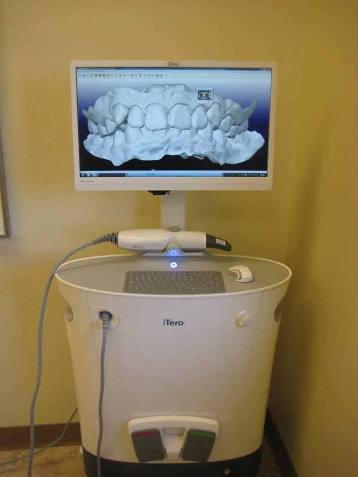 Custom Orthodontics: Dr. Thomas Herberger, Inc.