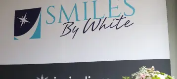 Smiles By White