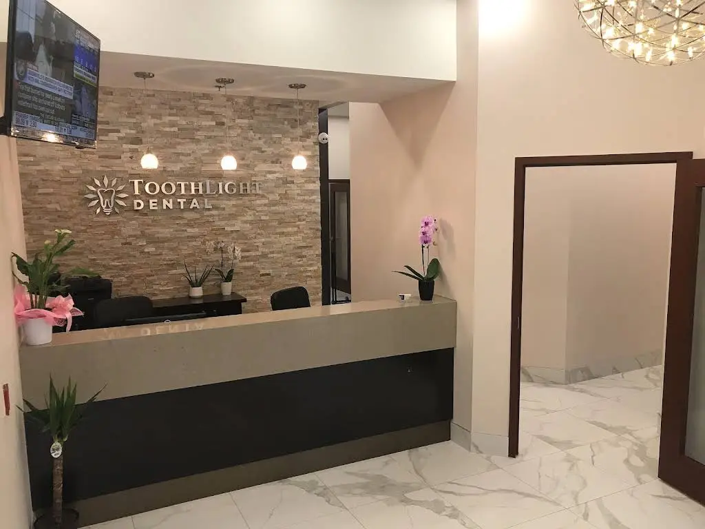 ToothLight Dental - Professional dental clinic exterior with modern facilities