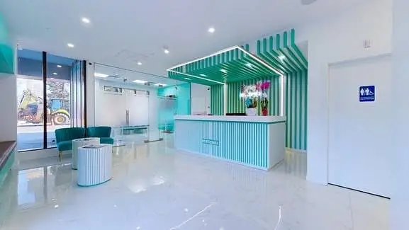 DentiSmile Dental Centre - Professional dental clinic exterior with modern facilities