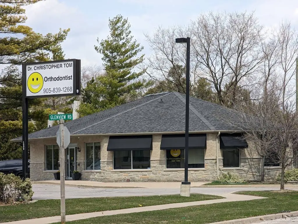 Dr. Christopher Tom - Professional dental clinic exterior with modern facilities