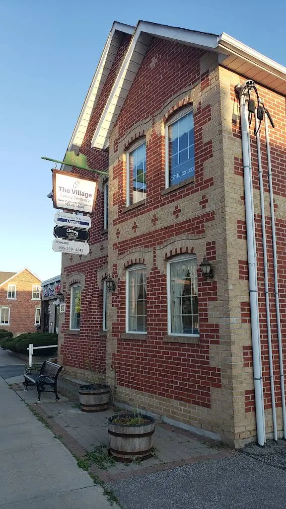 The Village Family Dentistry - Professional dental clinic exterior with modern facilities