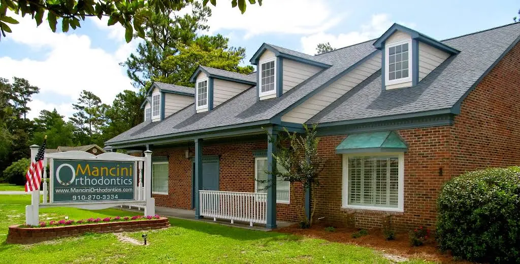 Mancini Orthodontics - Professional dental clinic exterior with modern facilities