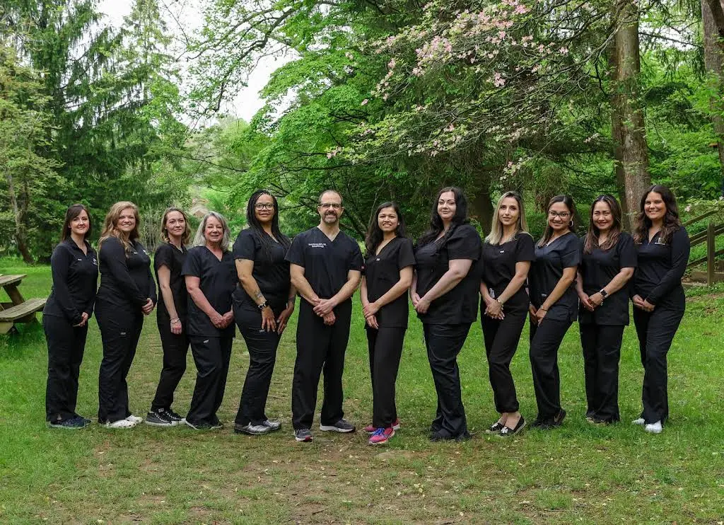 Sam B Khoury DDS MS - Dental Implant & Perio Surgeons - Professional dental clinic exterior with modern facilities
