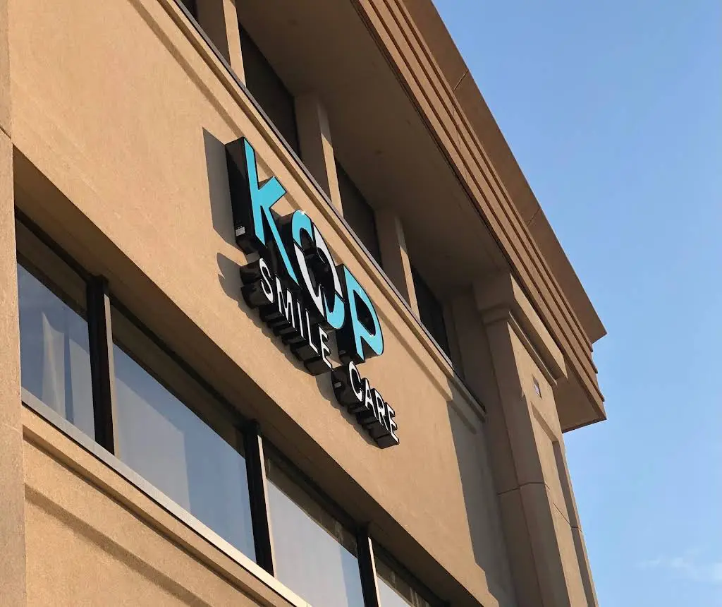KOP Smile Care - Professional dental clinic exterior with modern facilities