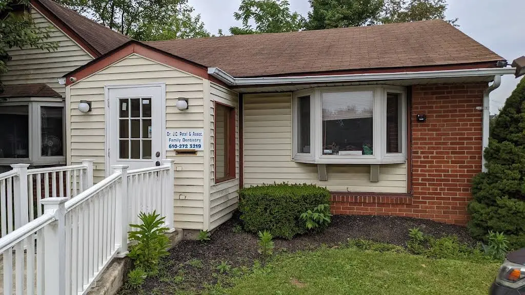 J C Patel & Associates - Professional dental clinic exterior with modern facilities