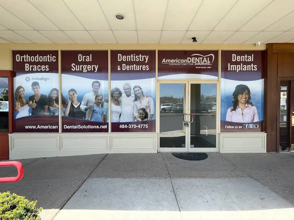 American Dental Solutions - Professional dental clinic exterior with modern facilities
