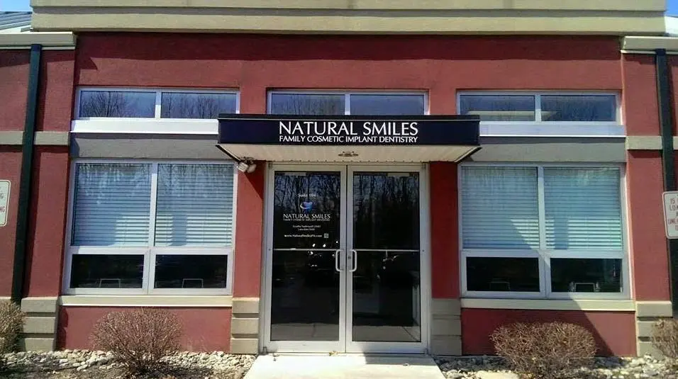 Natural Smiles - Professional dental clinic exterior with modern facilities