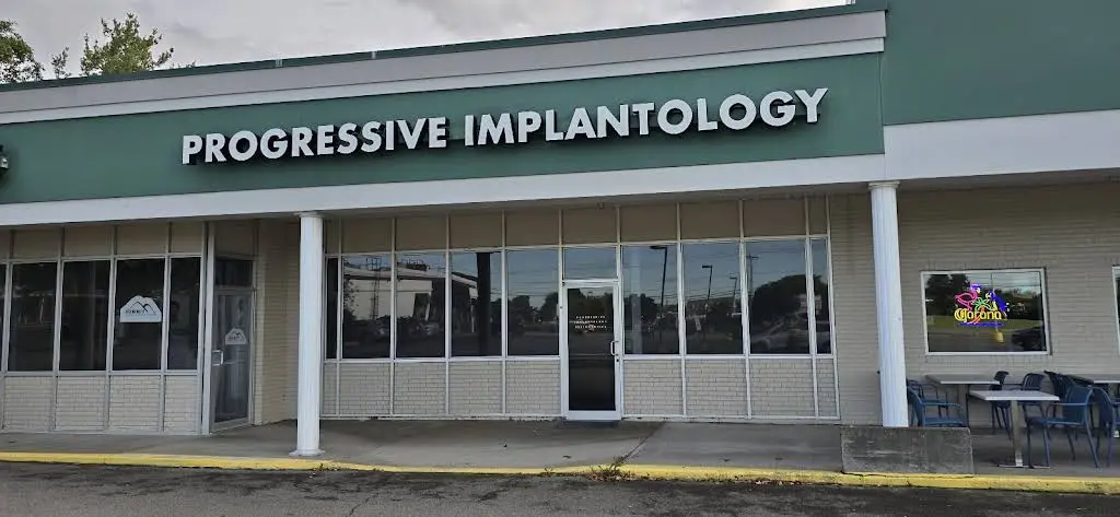 Progressive Implantology & Periodontics - Professional dental clinic exterior with modern facilities
