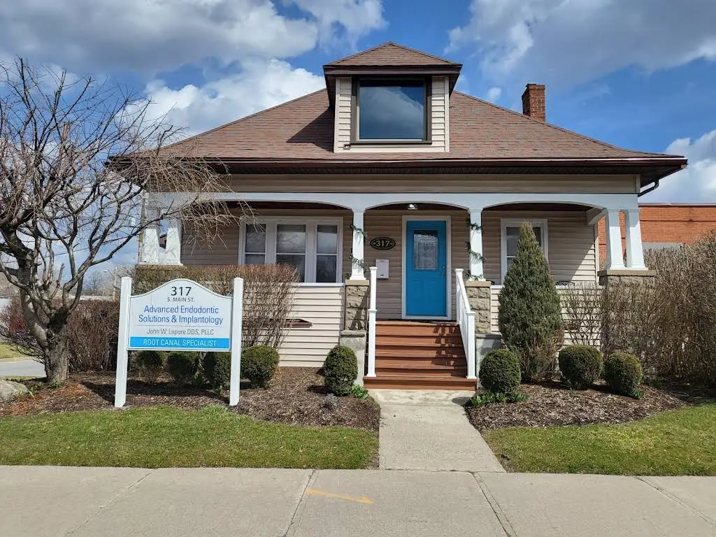 Advanced Endodontic Solutions - Professional dental clinic exterior with modern facilities