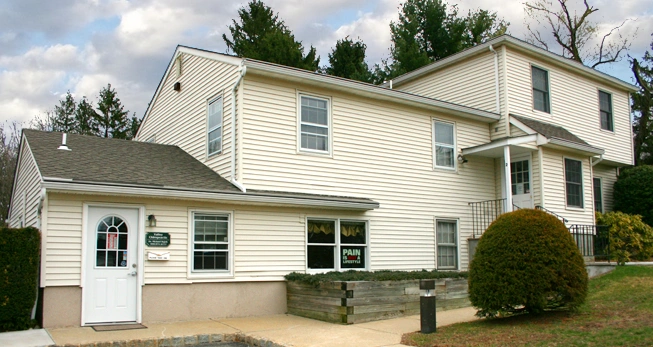 Malama Dental - Professional dental clinic exterior with modern facilities