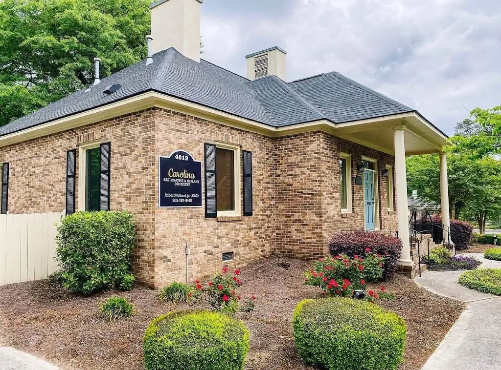 Carolina Restorative & Implant Dentistry - Professional dental clinic exterior with modern facilities
