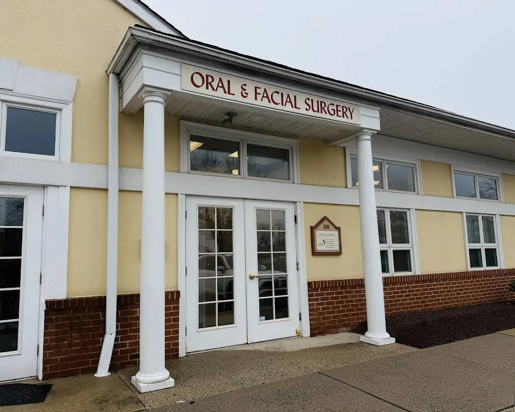 Oral & Maxillofacial Surgeons, PC - Professional dental clinic exterior with modern facilities