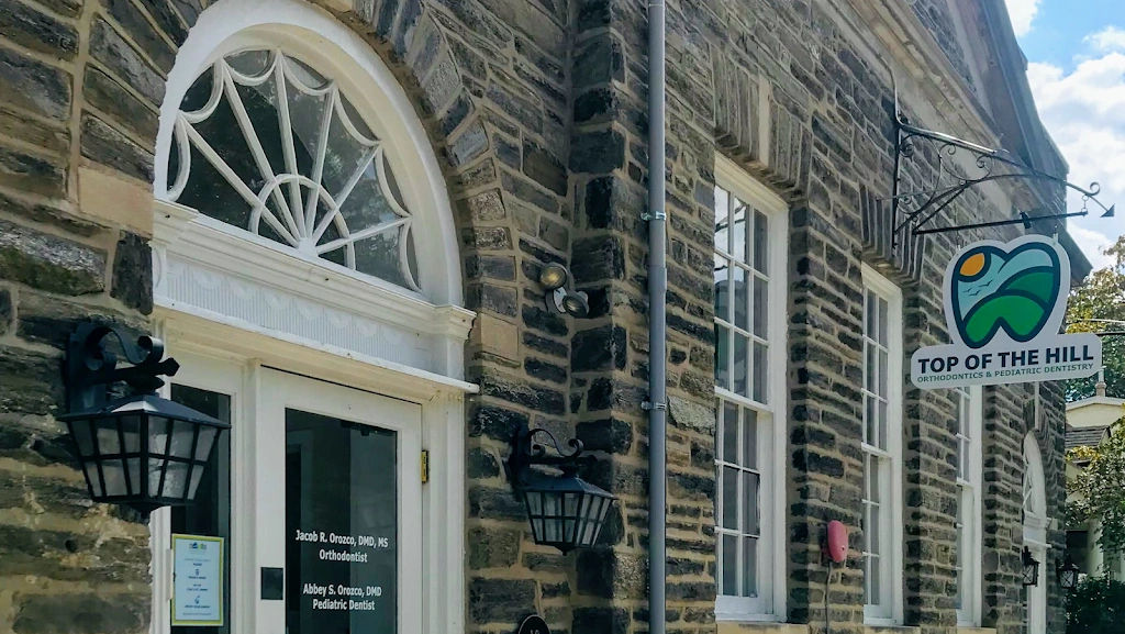 Top of the Hill Orthodontics & Pediatric Dentistry - Professional dental clinic exterior with modern facilities