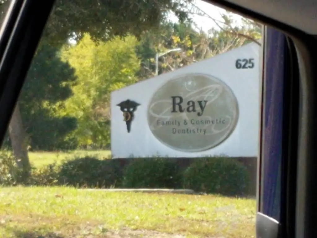 Ray Family & Cosmetic Dentistry - Professional dental clinic exterior with modern facilities