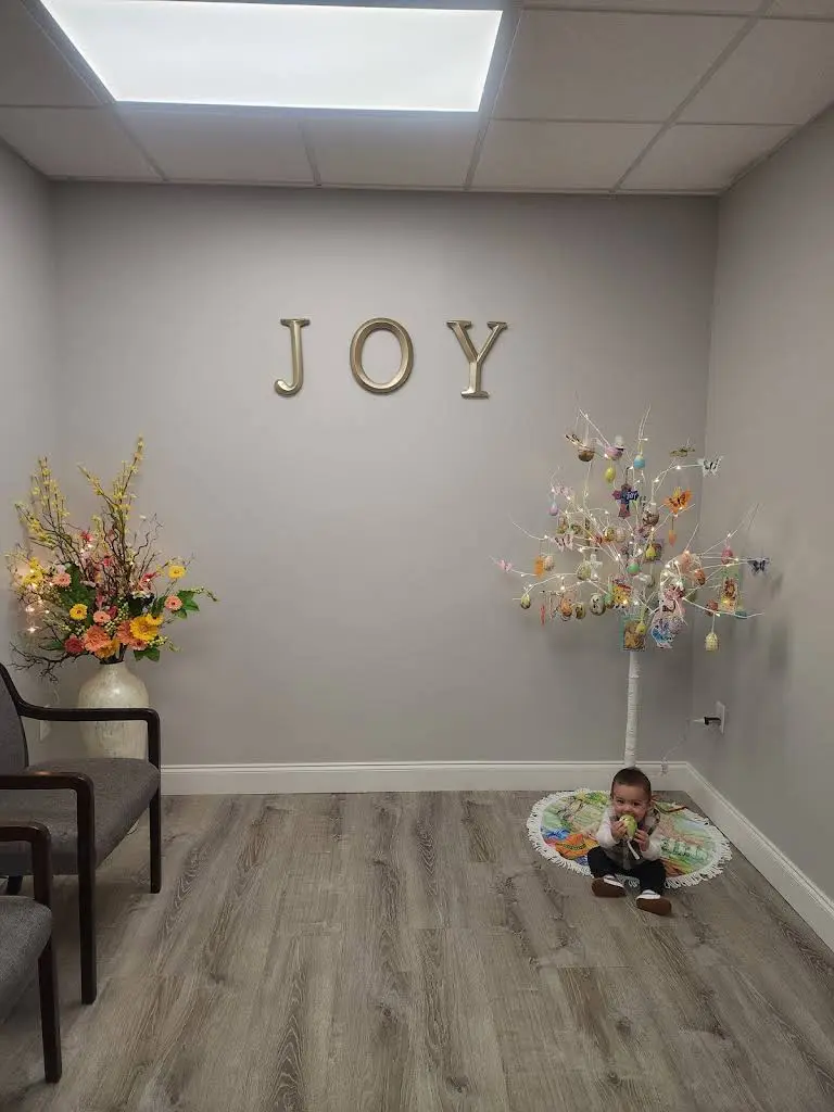Joy Dental - Professional dental clinic exterior with modern facilities