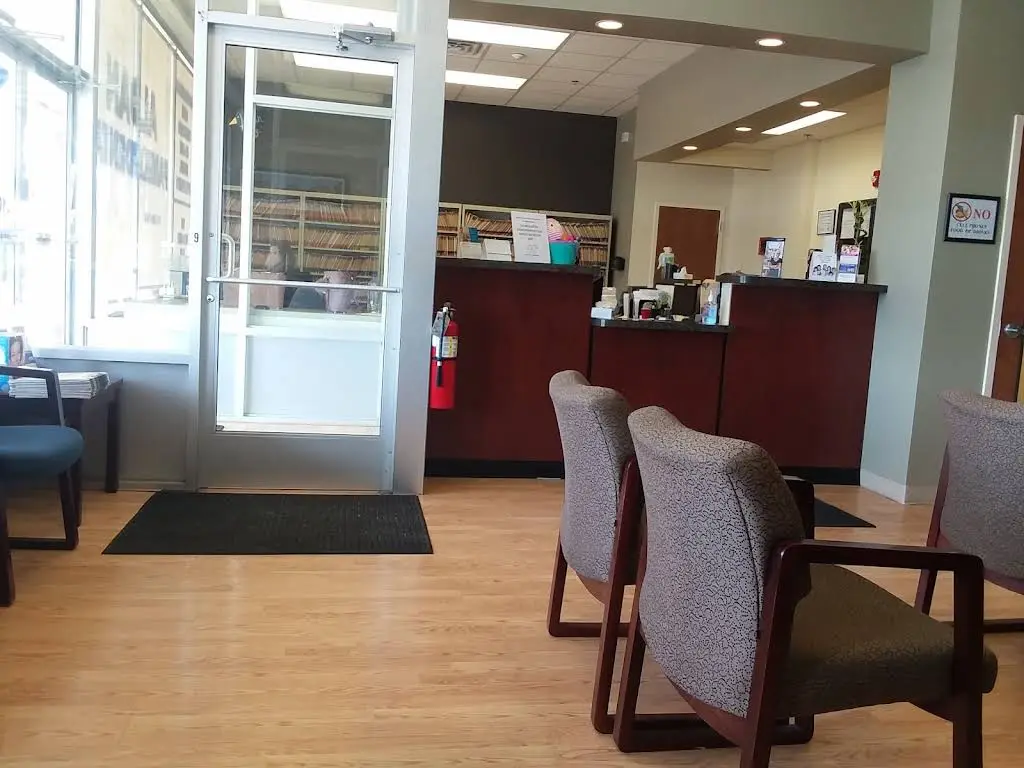 Family Dental Care Center - Professional dental clinic exterior with modern facilities