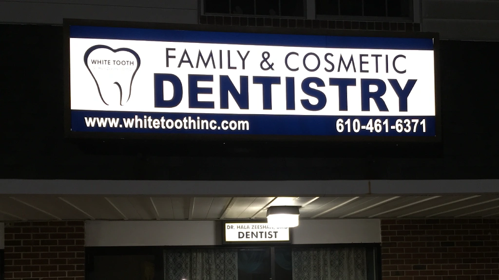 White Tooth Inc. - Professional dental clinic exterior with modern facilities