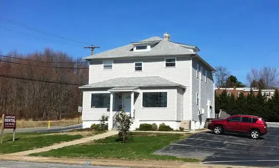 HappyCare Dental / Emily Hu, DDS Dental Office Dentist - Professional dental clinic exterior with modern facilities