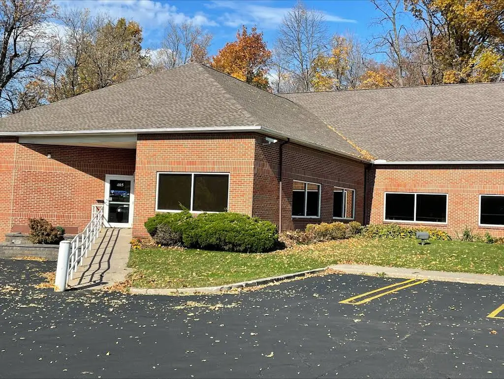 FLX Periodontics Fairport - Professional dental clinic exterior with modern facilities