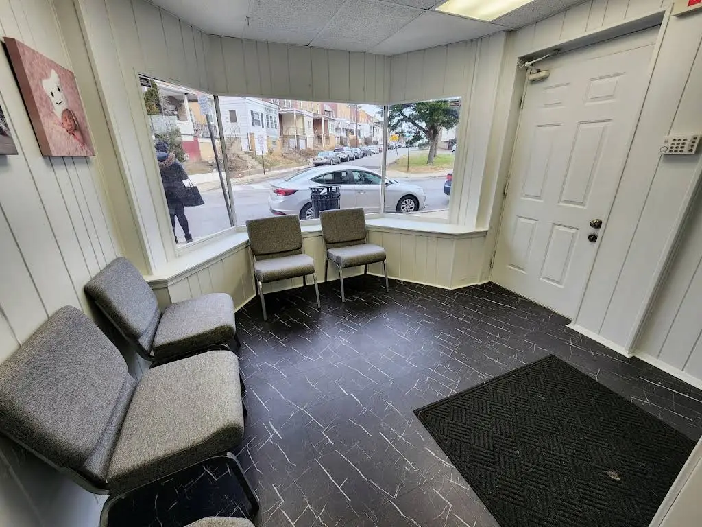 Smile Team - Professional dental clinic exterior with modern facilities