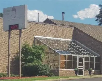 Fine Dentistry For Adults - Professional dental clinic exterior with modern facilities