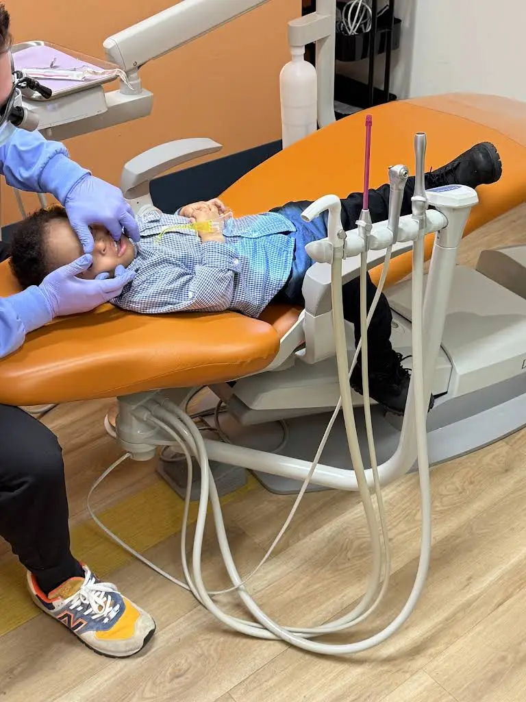 Pediatric Dental Excellence - Professional dental clinic exterior with modern facilities