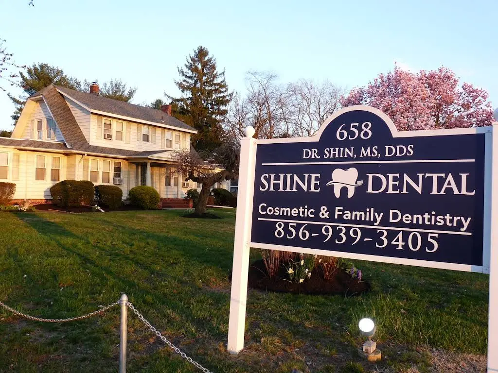 Shine Dental Care - Professional dental clinic exterior with modern facilities
