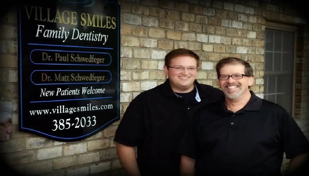 Village Smiles - Professional dental clinic exterior with modern facilities