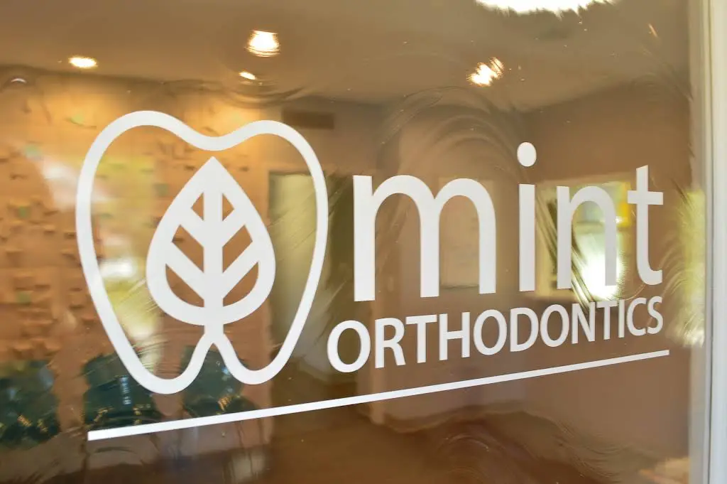 Mint Orthodontics LLC - Professional dental clinic exterior with modern facilities