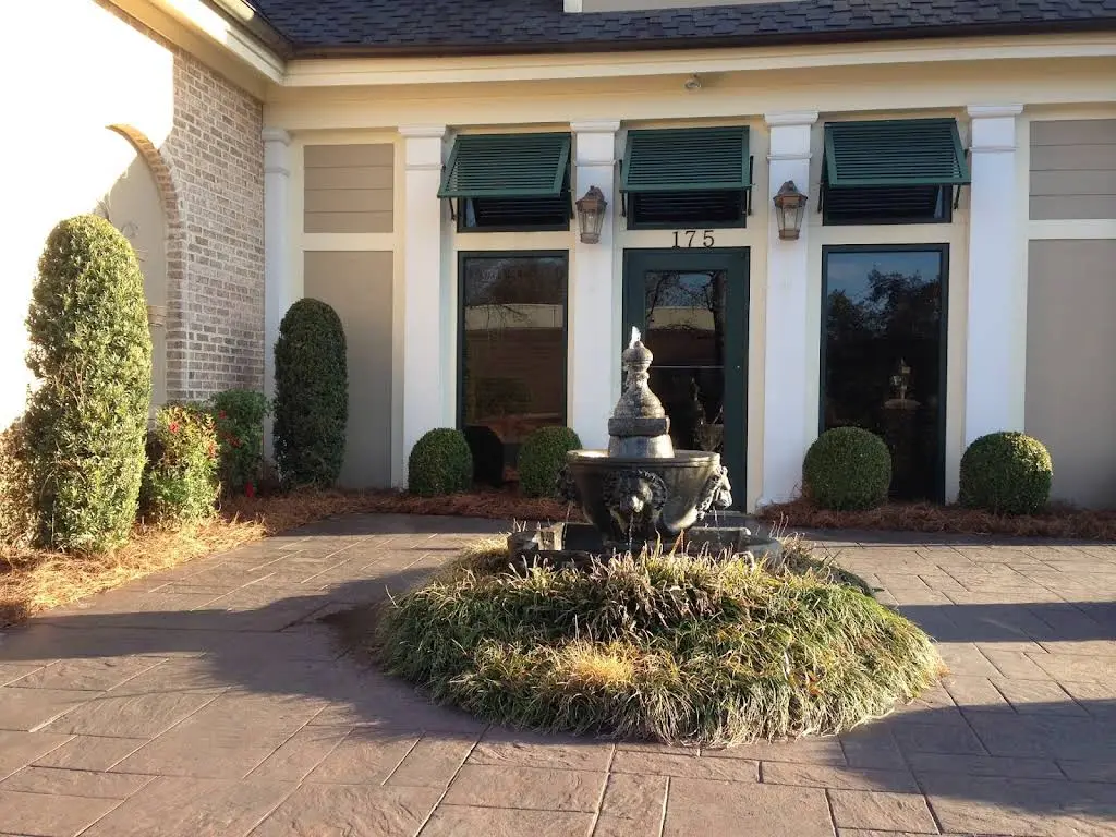 Charismatic Smiles - Professional dental clinic exterior with modern facilities