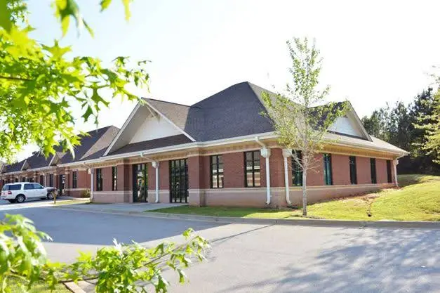 Sunset Dental - Professional dental clinic exterior with modern facilities