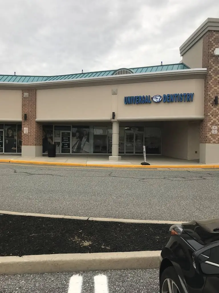 Universal Dentistry - Professional dental clinic exterior with modern facilities