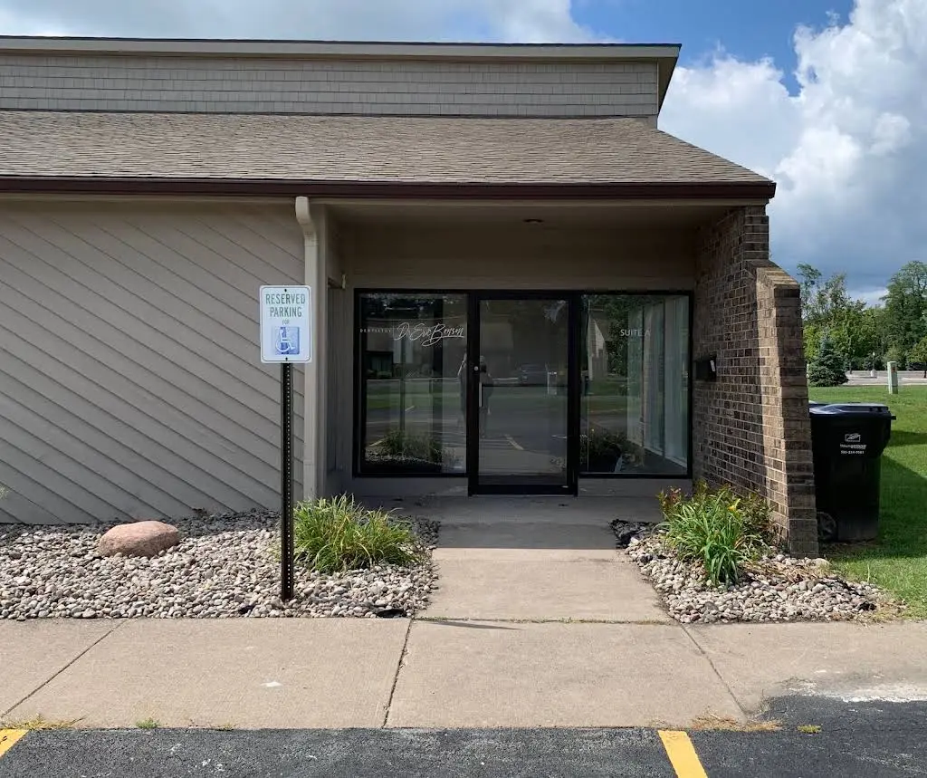 ROC Smiles - Professional dental clinic exterior with modern facilities