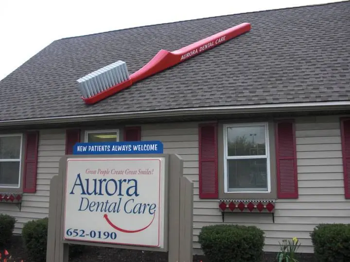 Aurora Dental Care - Professional dental clinic exterior with modern facilities