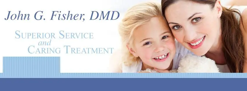 John G. Fisher, DMD - Professional dental clinic exterior with modern facilities